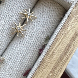 Gold northern star studs earrings